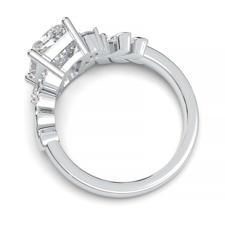 Radiant cut diamond engagement ring with leaf design.