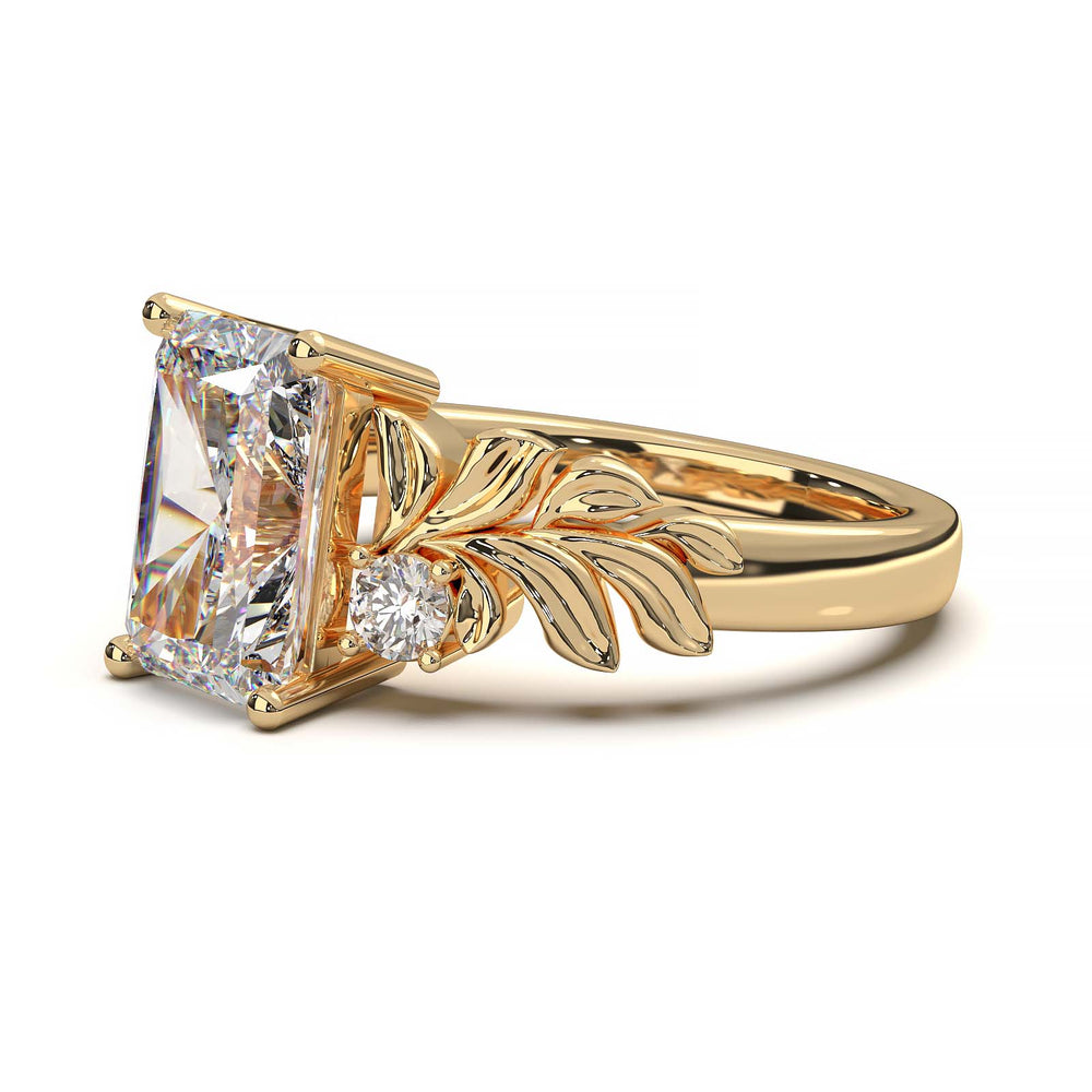 Radiant cut diamond engagement ring with leaf design.