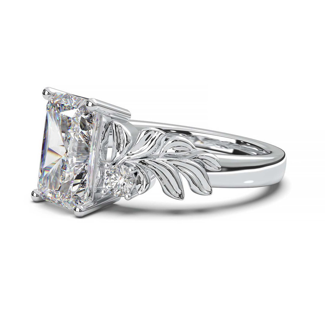 Radiant cut diamond engagement ring with leaf design.