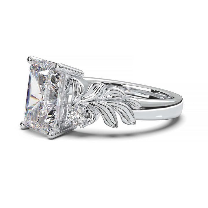 Radiant cut diamond engagement ring with leaf design.