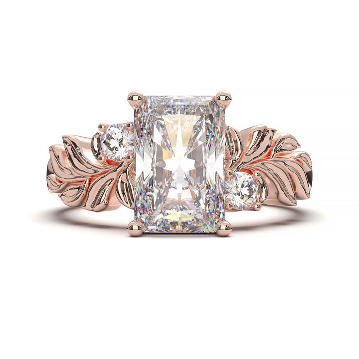 Radiant cut diamond engagement ring with leaf design.