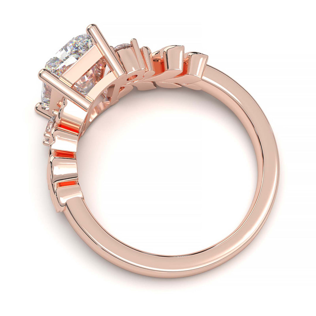 Radiant cut diamond engagement ring with leaf design.