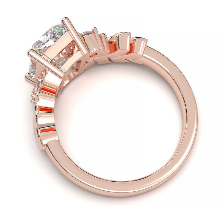 Radiant cut diamond engagement ring with leaf design.