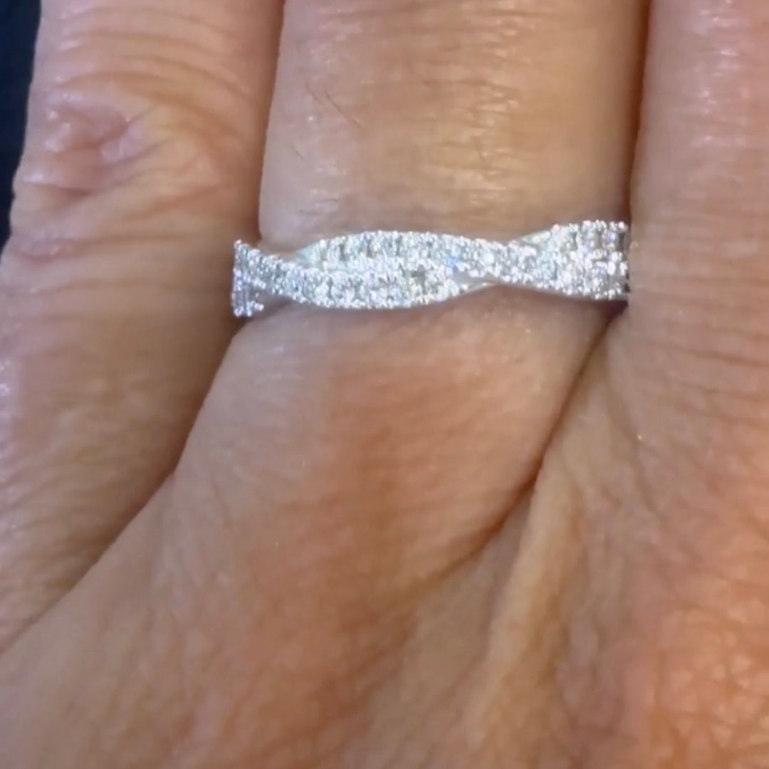 TWISTED LAB GROWN DIAMOND WEDDING-BAND on a finger
