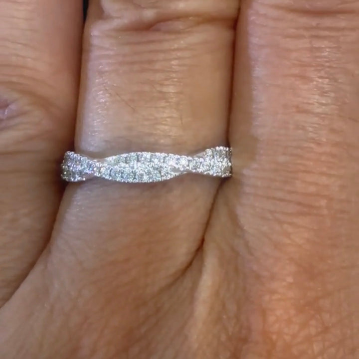 TWISTED LAB GROWN DIAMOND WEDDING-BAND on a finger