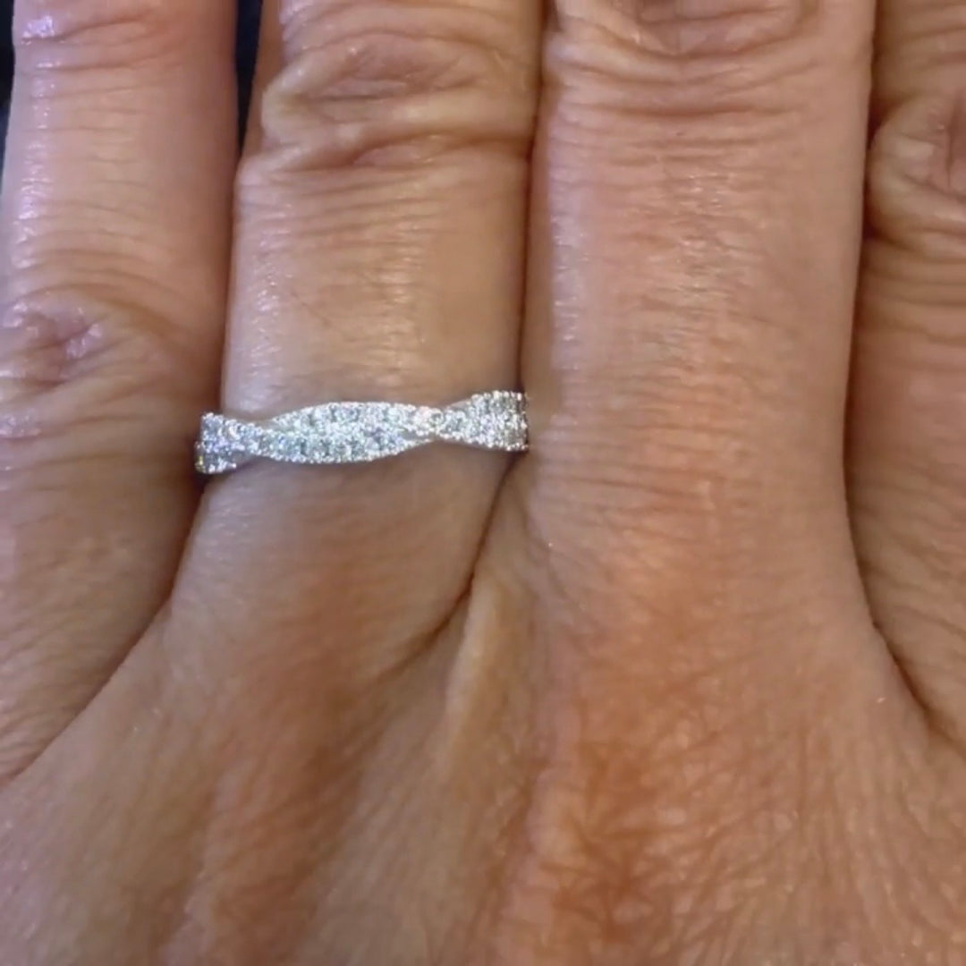 TWISTED LAB GROWN DIAMOND WEDDING-BAND on a finger