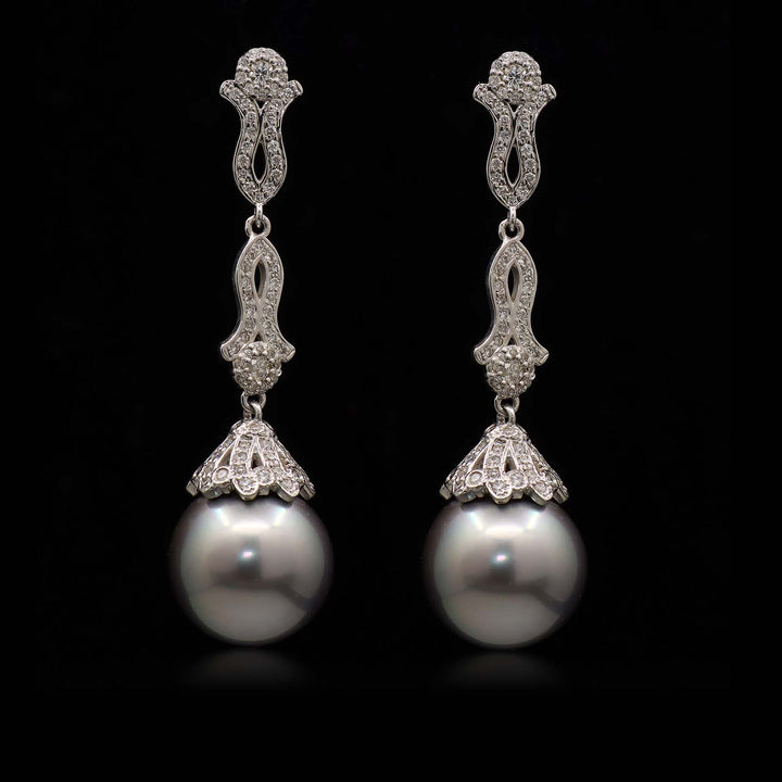 Tahitian pearl earrings with 15.5mm dark gray pearls, 18K white gold, and 1.26 ct natural diamonds.