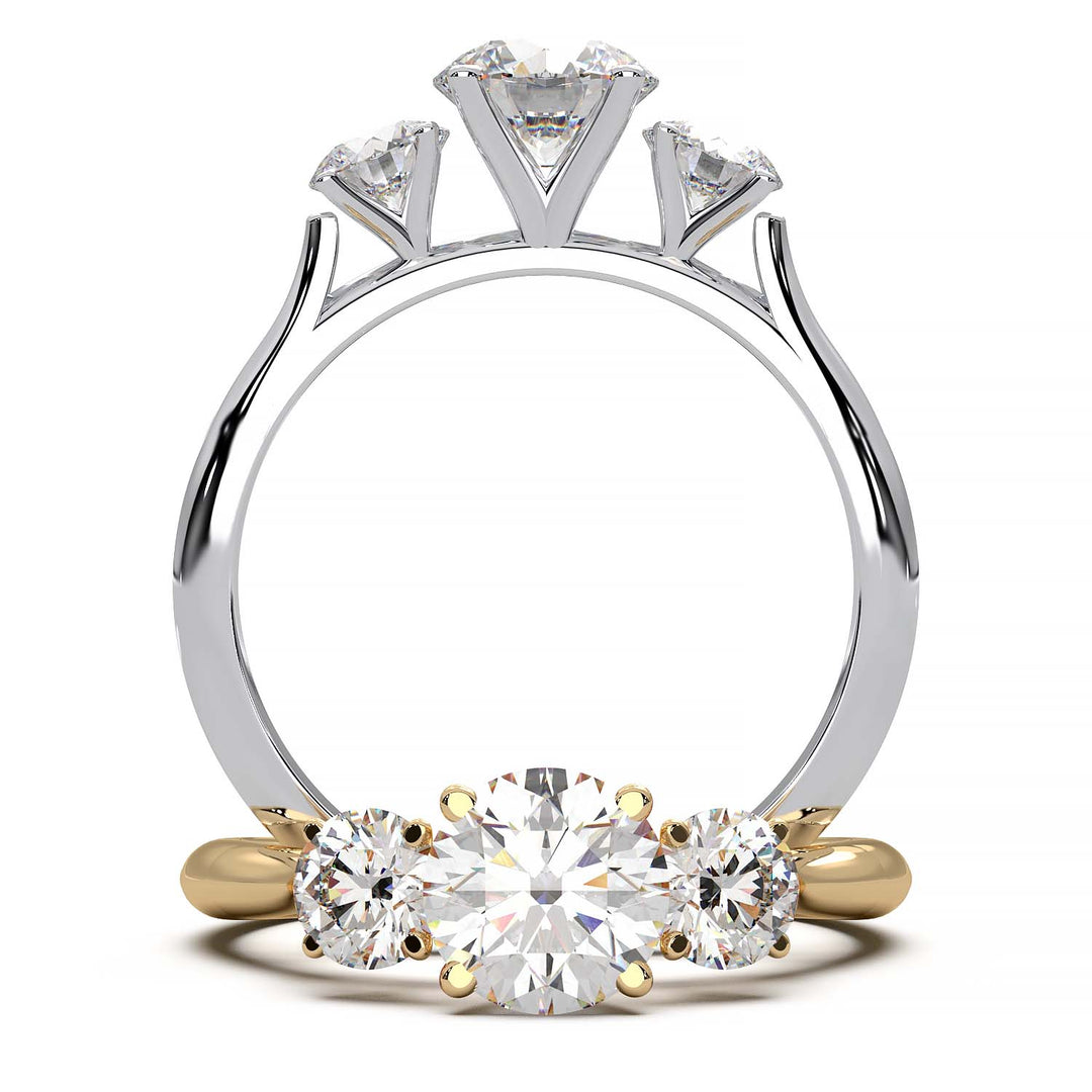 A cathedral-style three-stone diamond engagement ring featuring a central 0.5-carat round diamond, with two side diamonds in a gold or platinum band.