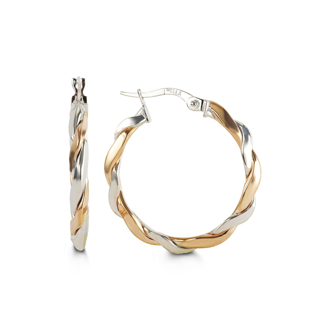 Stylish 10k rose and white gold twisted hoop earrings, 25mm in diameter, offering a unique and elegant look.