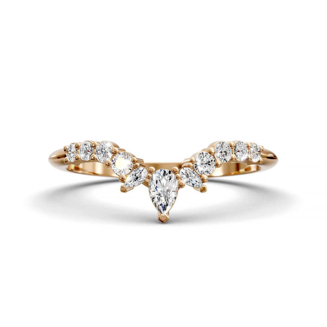 Curved V-shaped wedding band with pear center and side diamonds