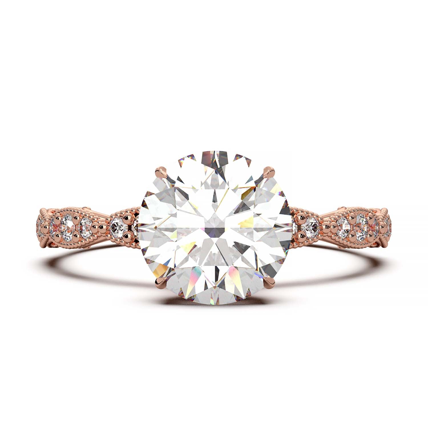 A vintage-style engagement ring featuring a large, round-cut diamond set in a gold band. The band is intricately detailed with smaller diamonds embedded in an ornate, floral and milgrain pattern, adding elegance and sparkle.