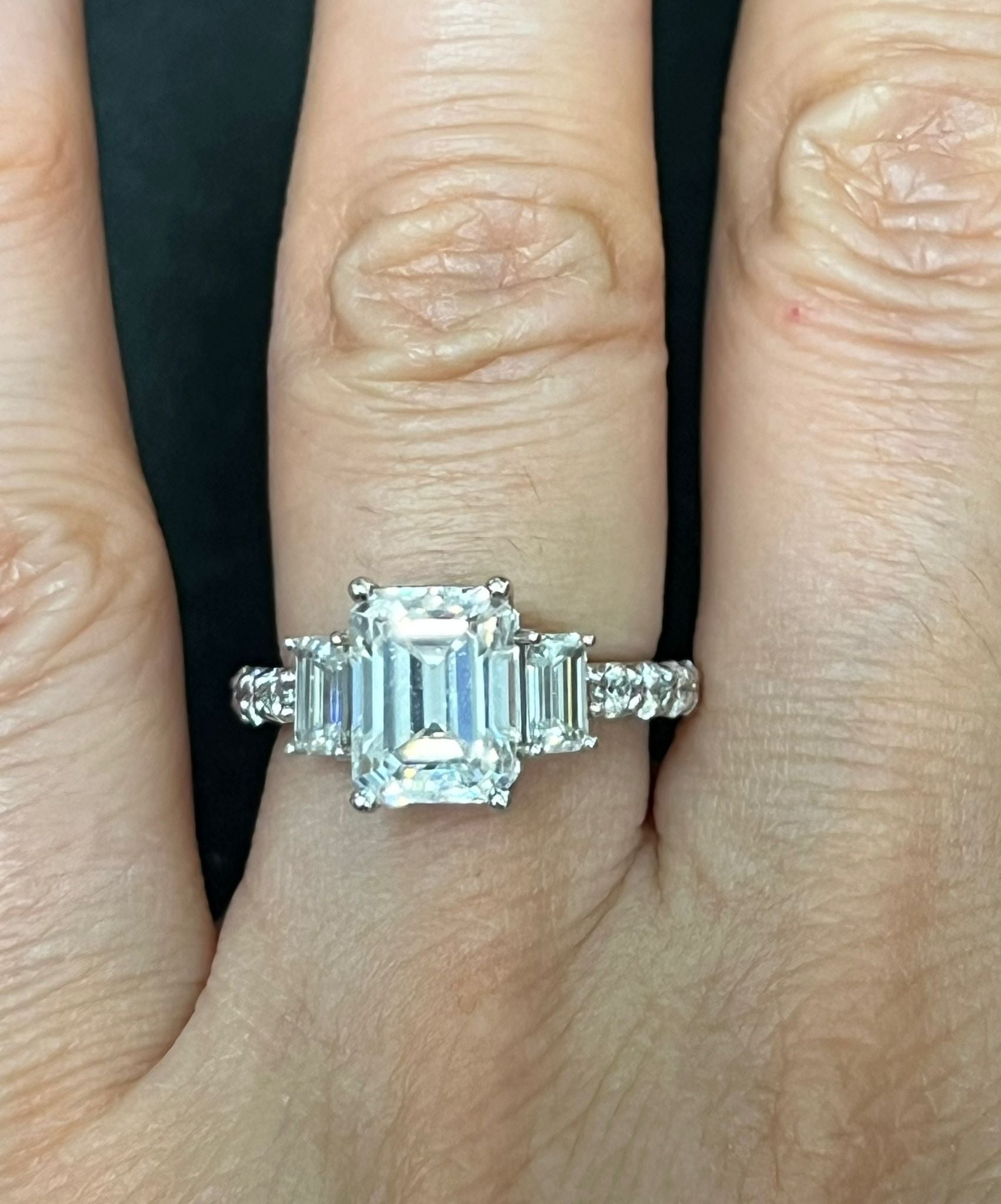 Chic 14K Gold Emerald Cut Moissanite Ring with Side Stones