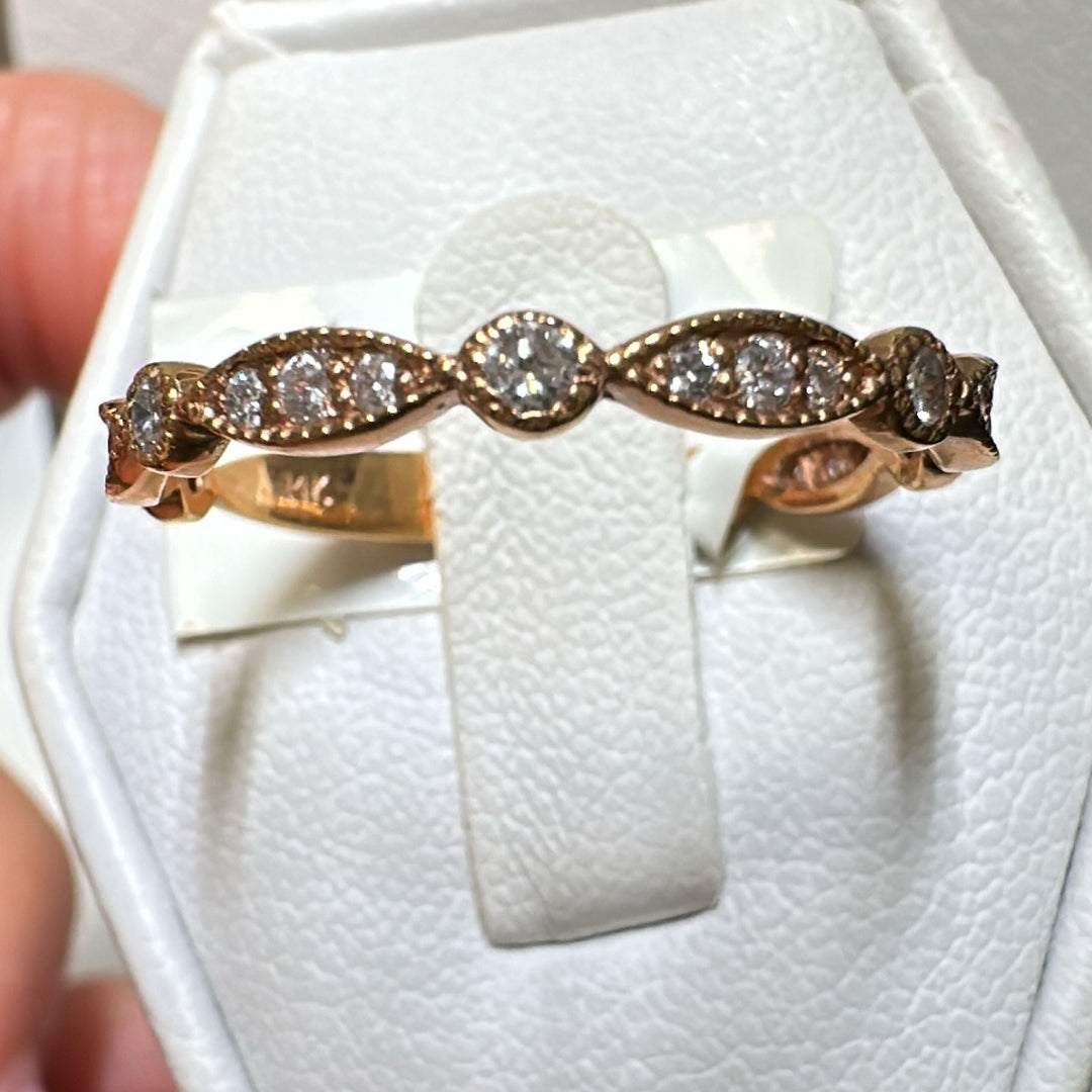 14K gold wedding band with lab-grown diamonds in a vintage-inspired design.