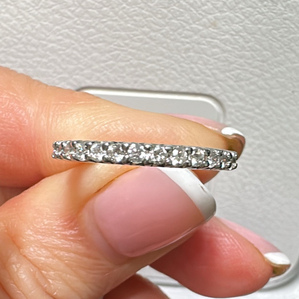 14K gold wedding band with 0.35 CT pave-set diamonds in a classic design.
