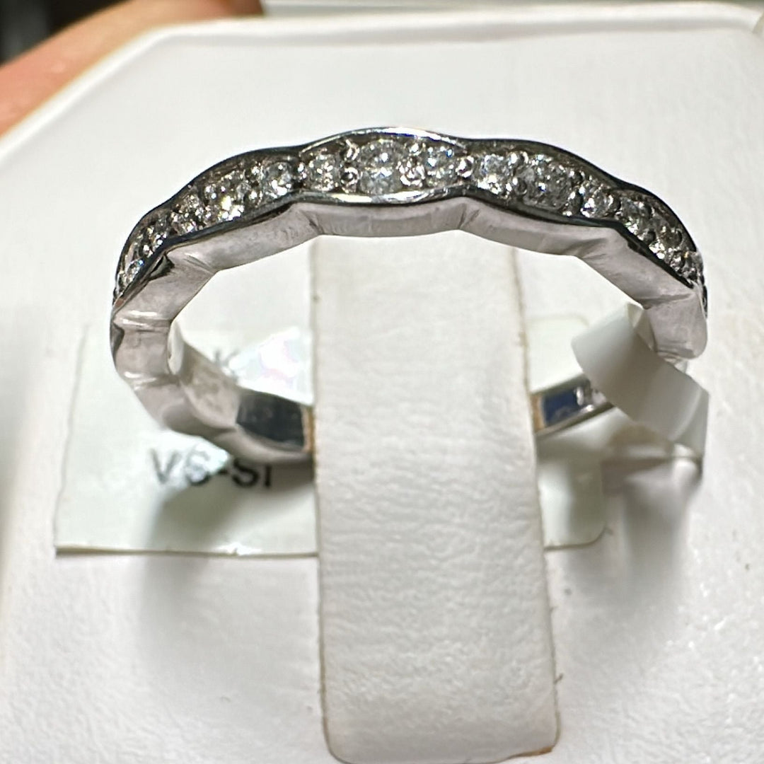 14K gold curved wedding band with 0.44 CT lab-grown diamonds.