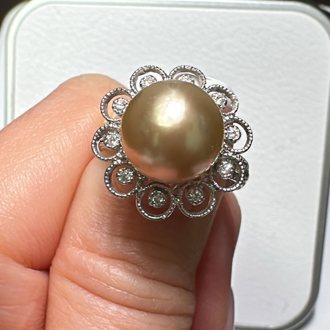 9mm Golden South Sea Pearl ring with diamond halo in 18K white gold.