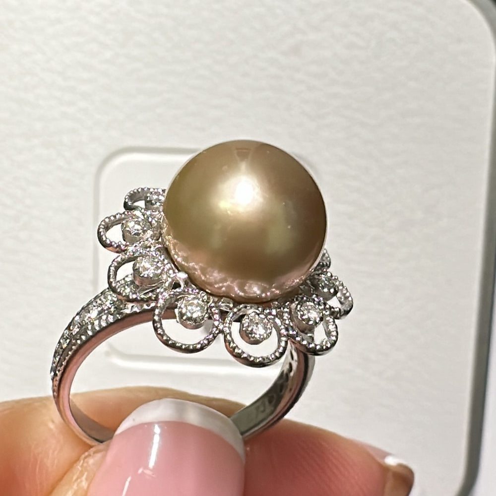 9mm Golden South Sea Pearl ring with diamond halo in 18K white gold.