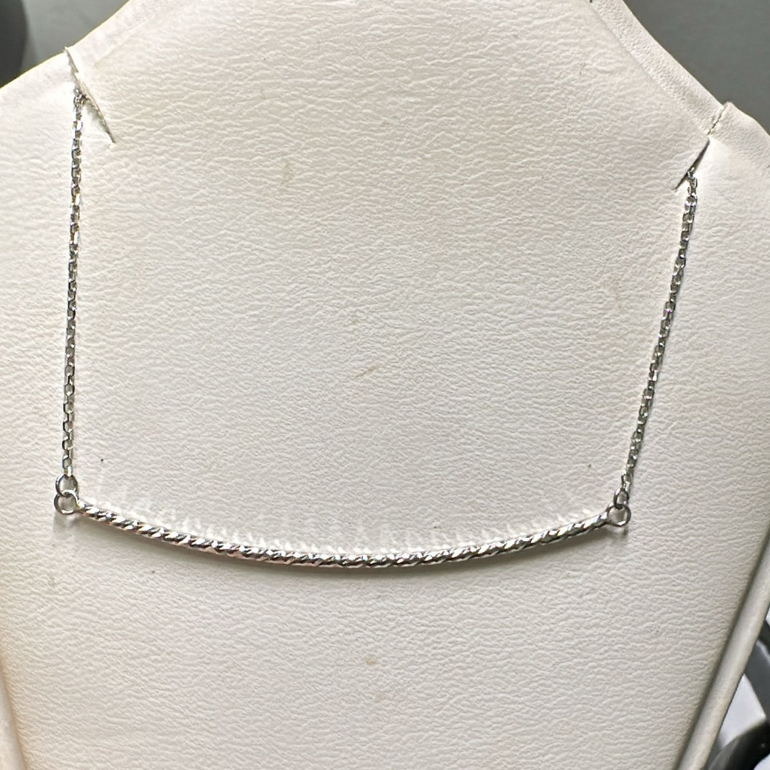 10K white gold diamond-cut bar necklace with a delicate chain, sleek design.