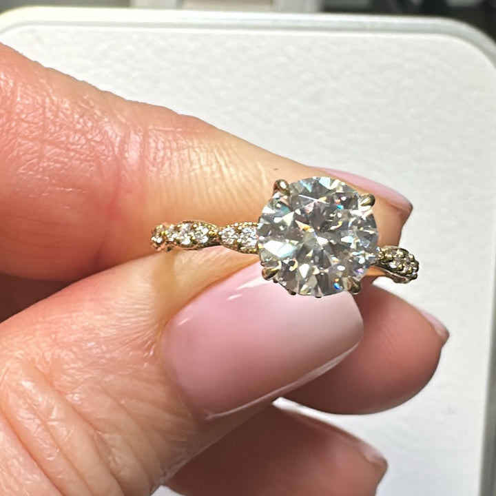 1.3 Ct round moissanite engagement ring with hidden halo in 14K gold.