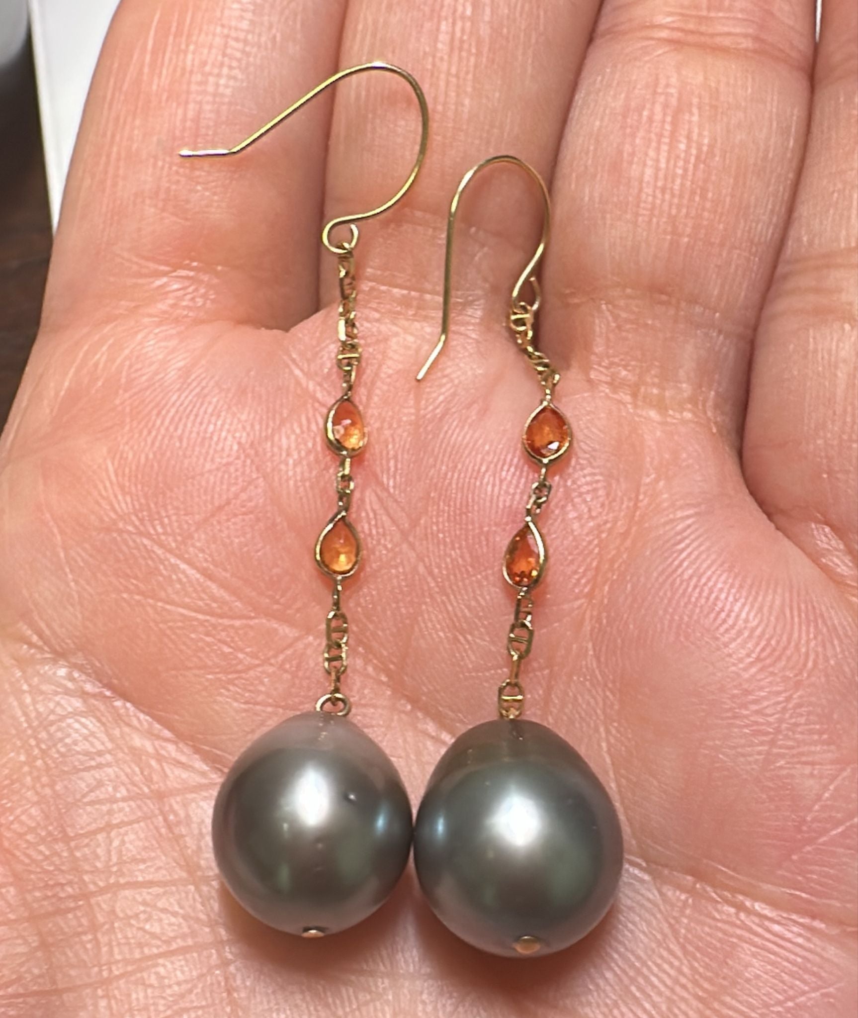 12.2mm tear drop Tahitian pearl earrings with yellow sapphire in 14K gold.