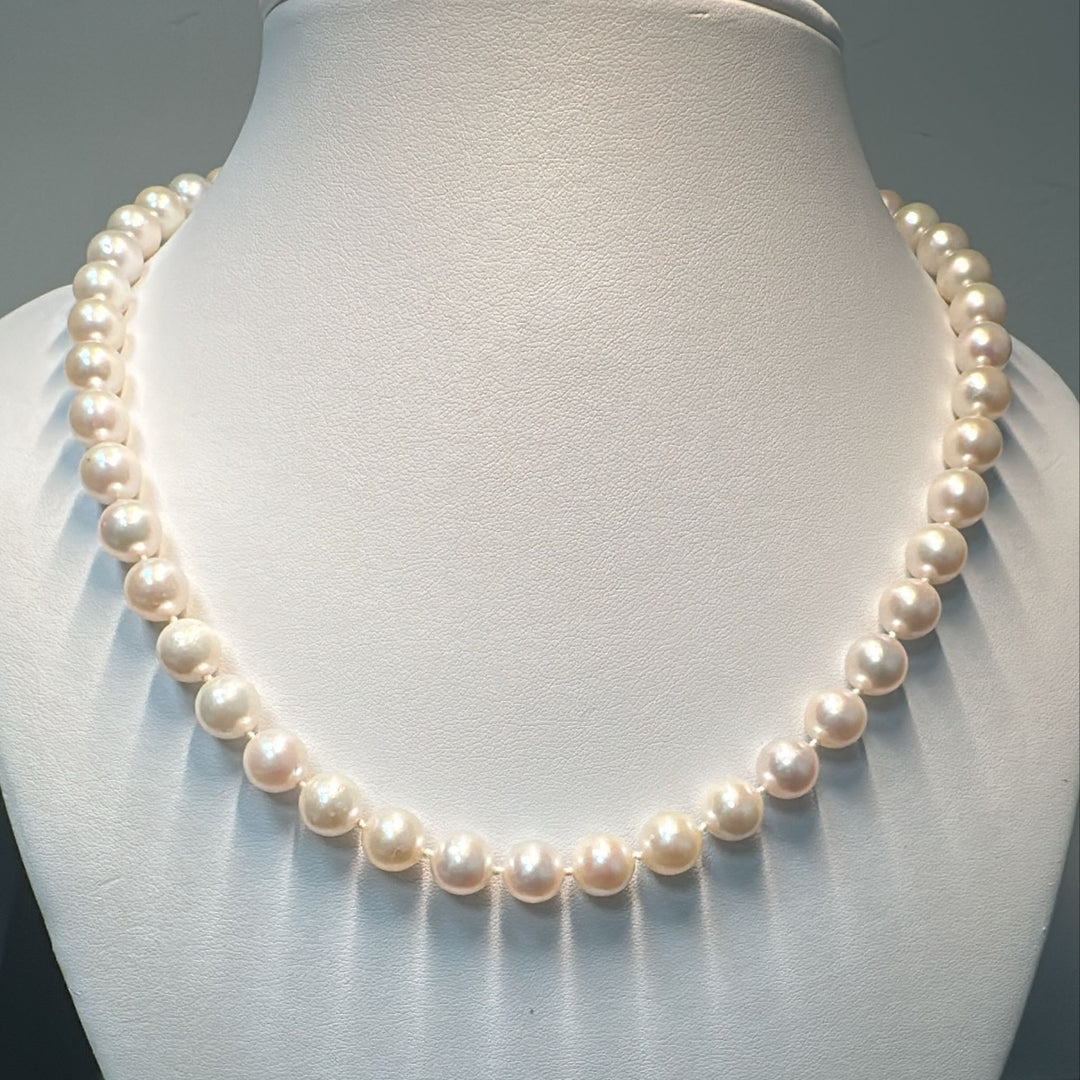 Freshwater pearl necklace with 47 graduated round pearls (9-8.5mm) and a 14K white gold clasp.