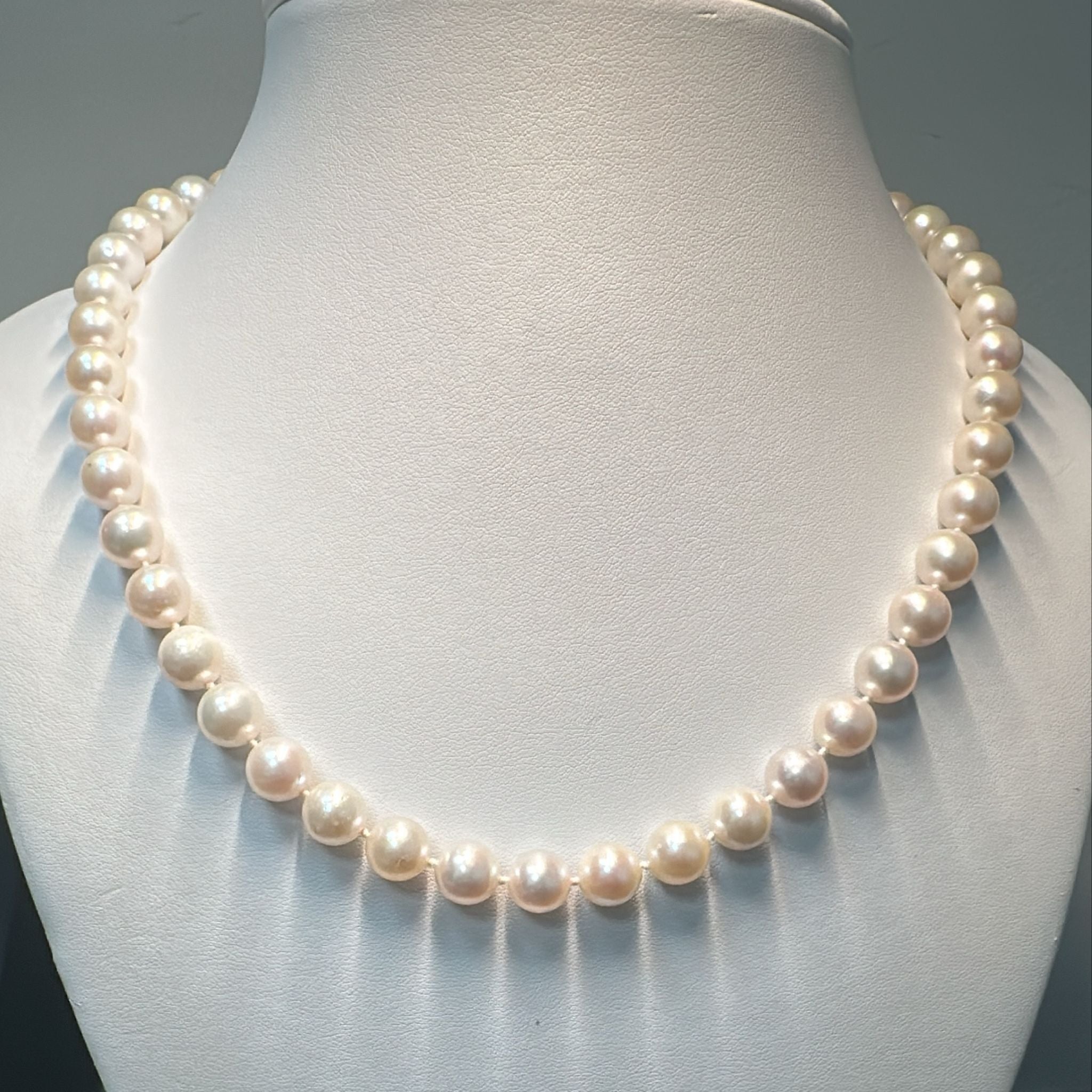 Freshwater pearl necklace with 47 graduated round pearls (9-8.5mm) and a 14K white gold clasp.