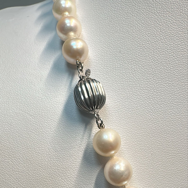 Freshwater pearl necklace with 47 graduated round pearls (9-8.5mm) and a 14K white gold clasp.