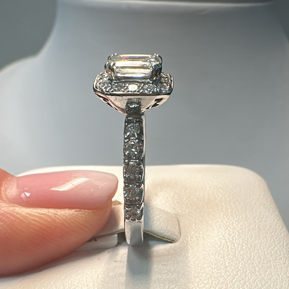 1.03 CT emerald-cut diamond halo engagement ring in 14K white gold with natural diamond accents.