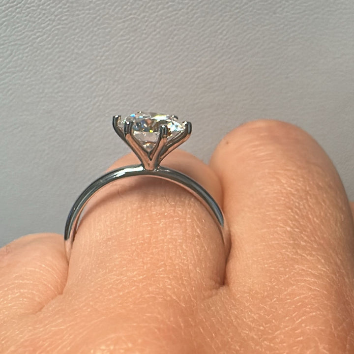 1.60 CT round moissanite solitaire ring in 14K white gold.