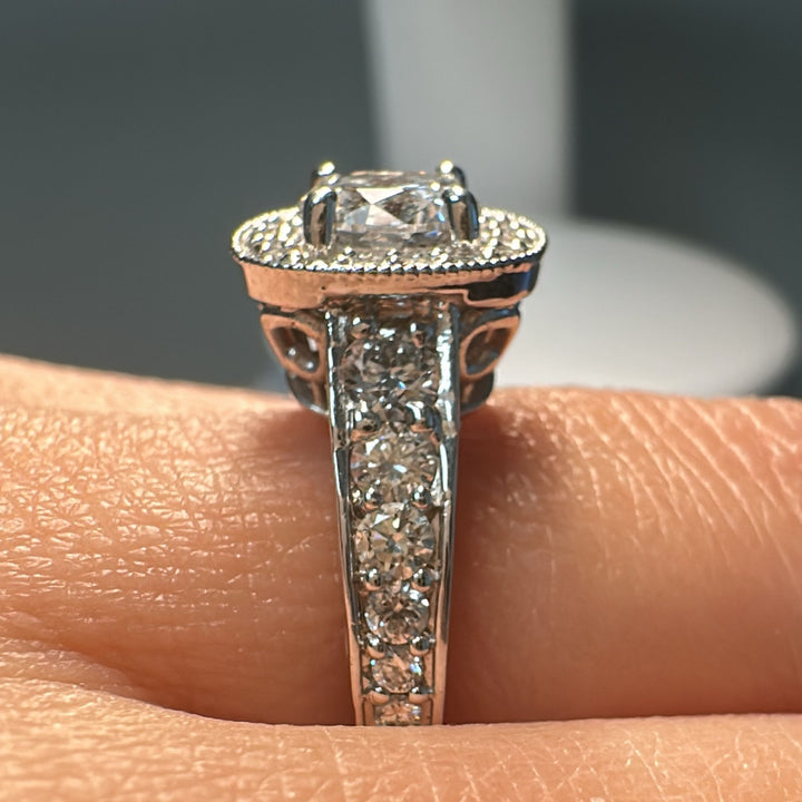1.02 CT lab-grown diamond halo engagement ring in 14K white gold.