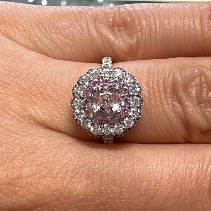 0.50 CT round lab diamond engagement ring with pink sapphire and moissanite halo on 14K gold.