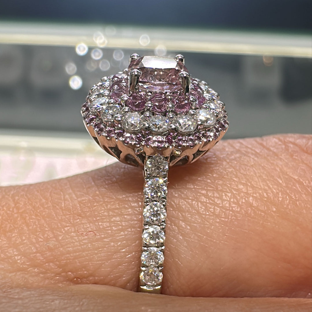 0.50 CT round lab diamond engagement ring with pink sapphire and moissanite halo on 14K gold.
