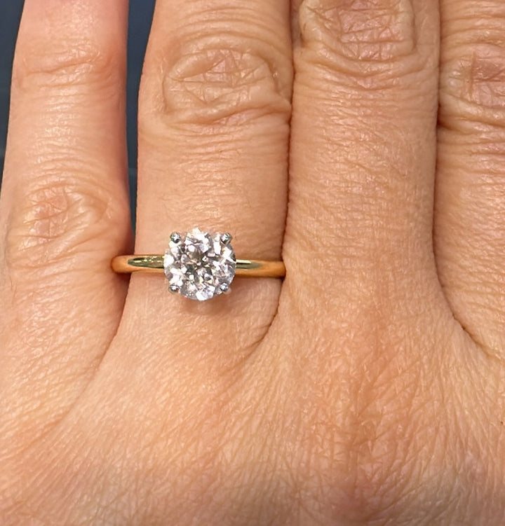 1 CT round morganite solitaire engagement ring in 14K gold.