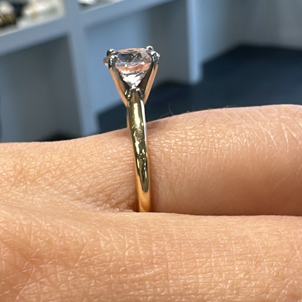 1 CT round morganite solitaire engagement ring in 14K gold.