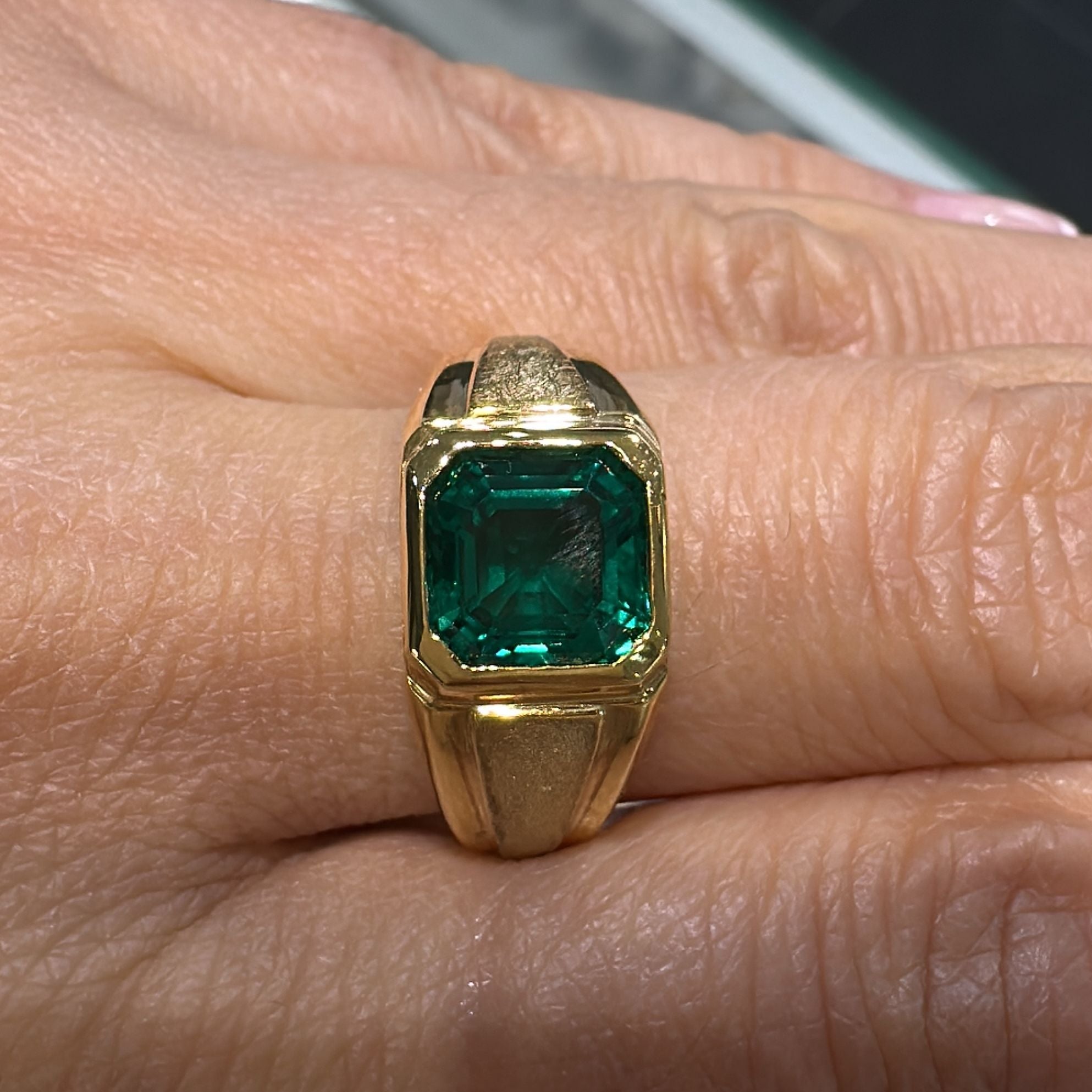 10K gold men’s ring with 2 CT Asscher cut lab-grown emerald in bezel setting