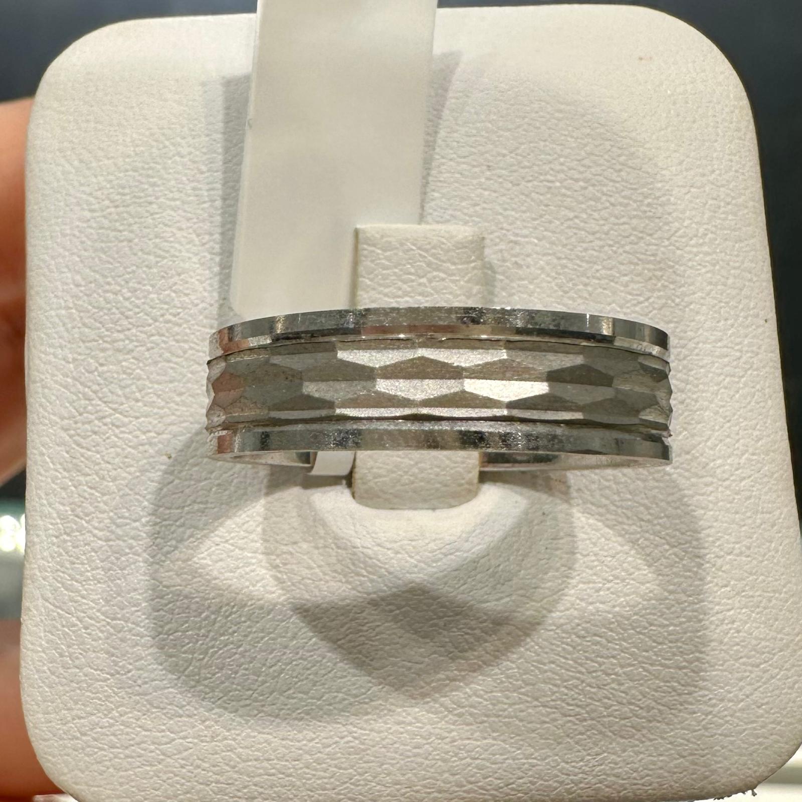10K white gold men’s wedding band with hammered faceted texture and polished edges