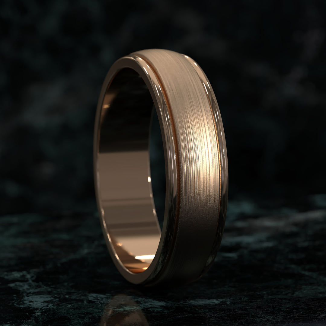 Brushed center domed men’s wedding band with rounded edges