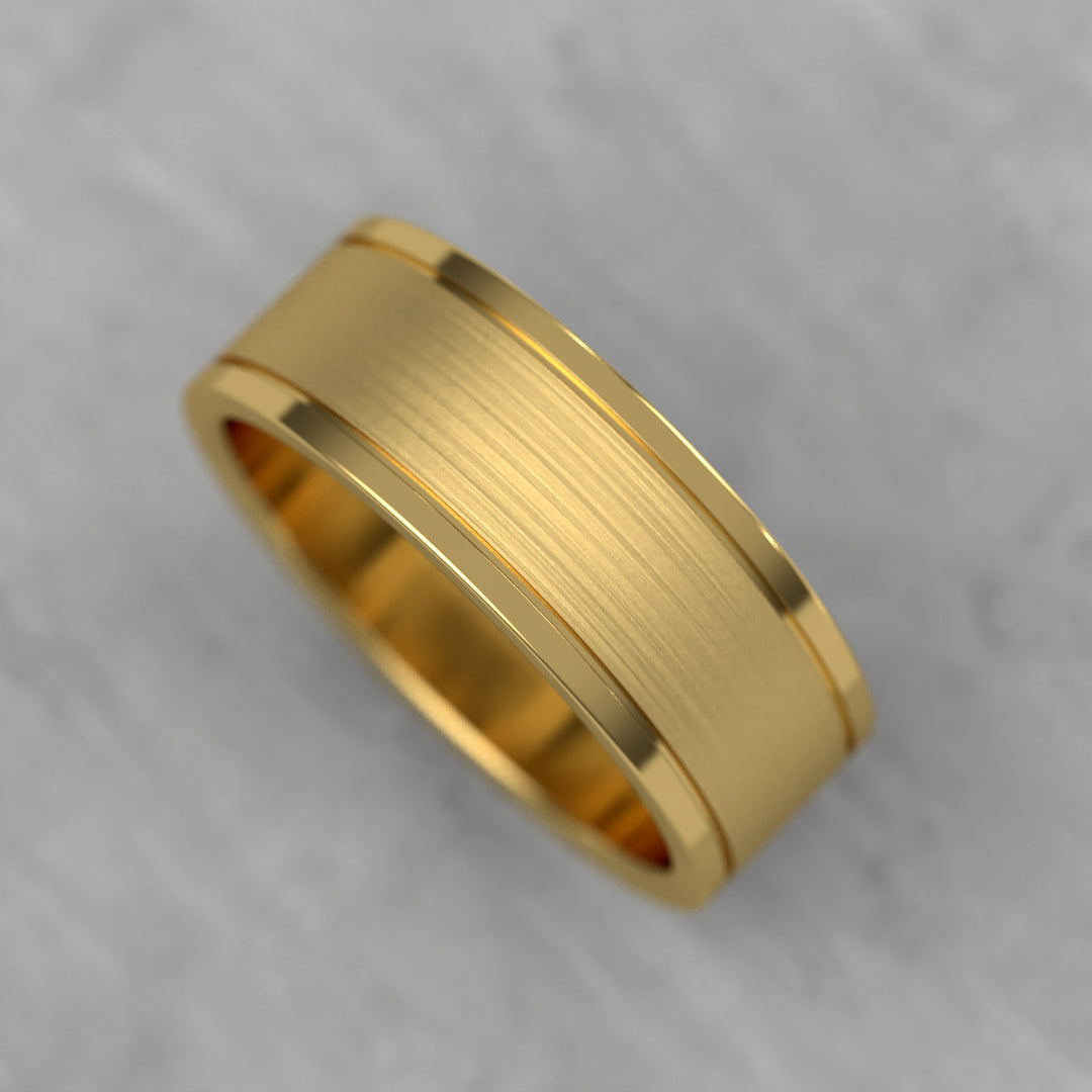 Center brushed men’s wedding band with polished double grooves