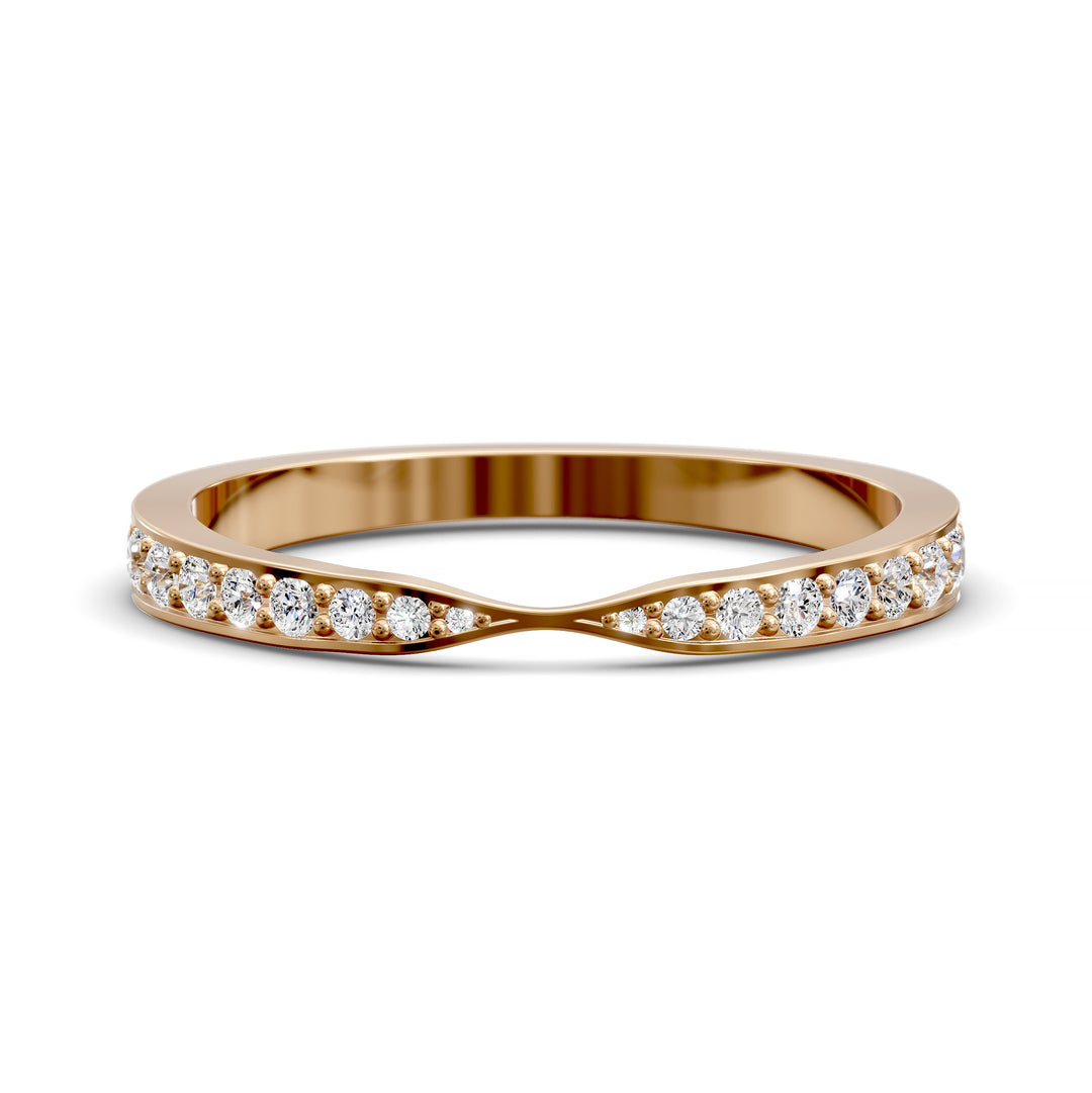 Channel set gold wedding band with tapered top and round brilliant stones