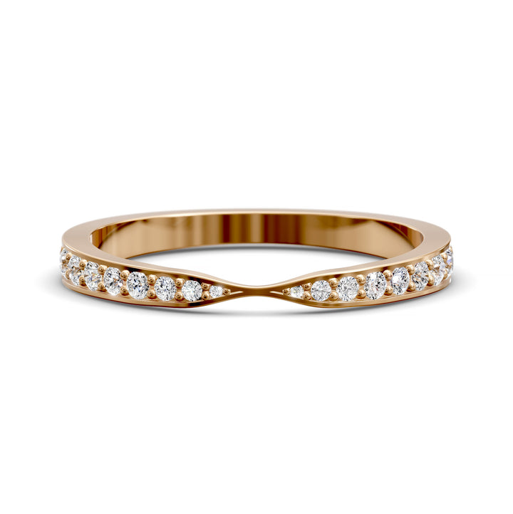 Channel set gold wedding band with tapered top and round brilliant stones