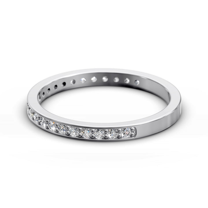 Channel set three-quarter eternity ring with round stones in polished gold