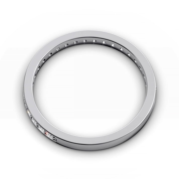 Channel set three-quarter eternity ring with round stones in polished gold