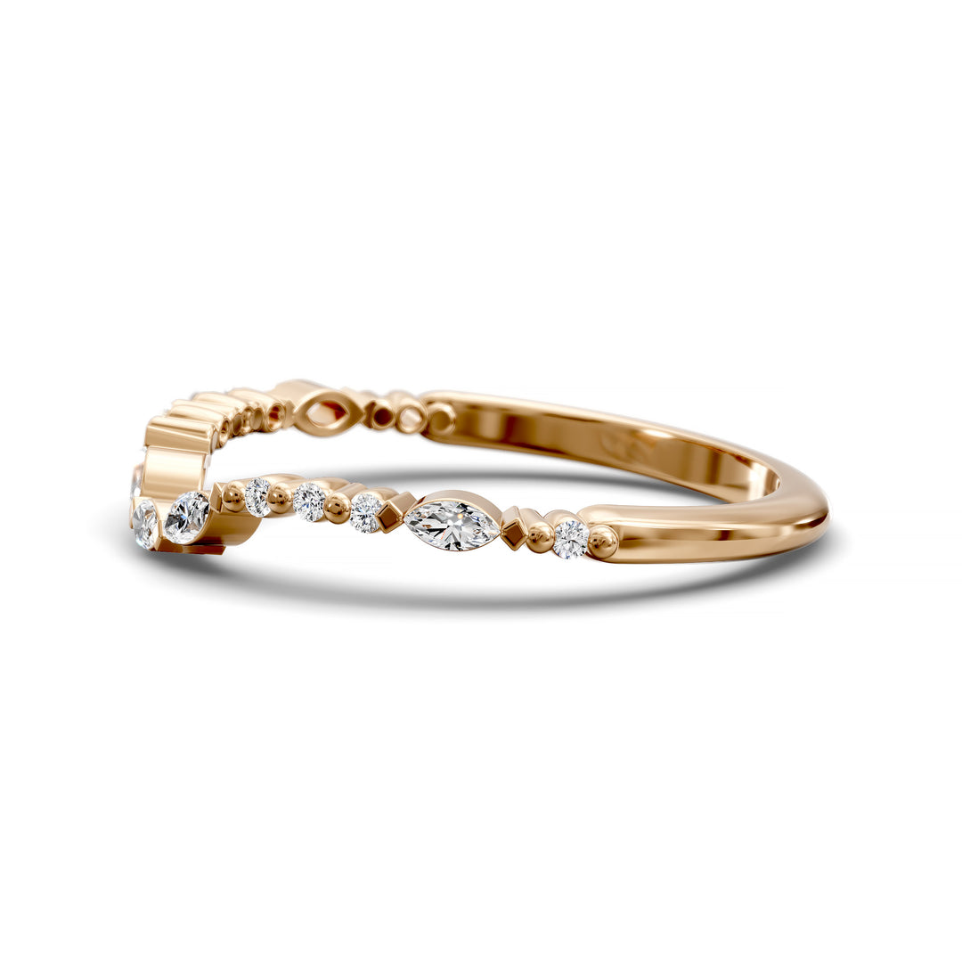Curved wedding band with alternating marquise and round stones in gold