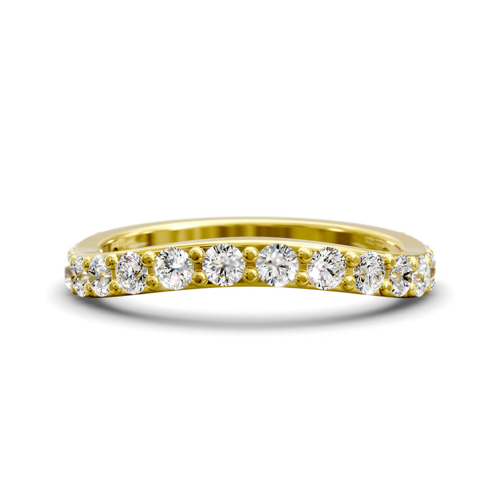 Curved half eternity diamond band with prong set round stones in polished gold