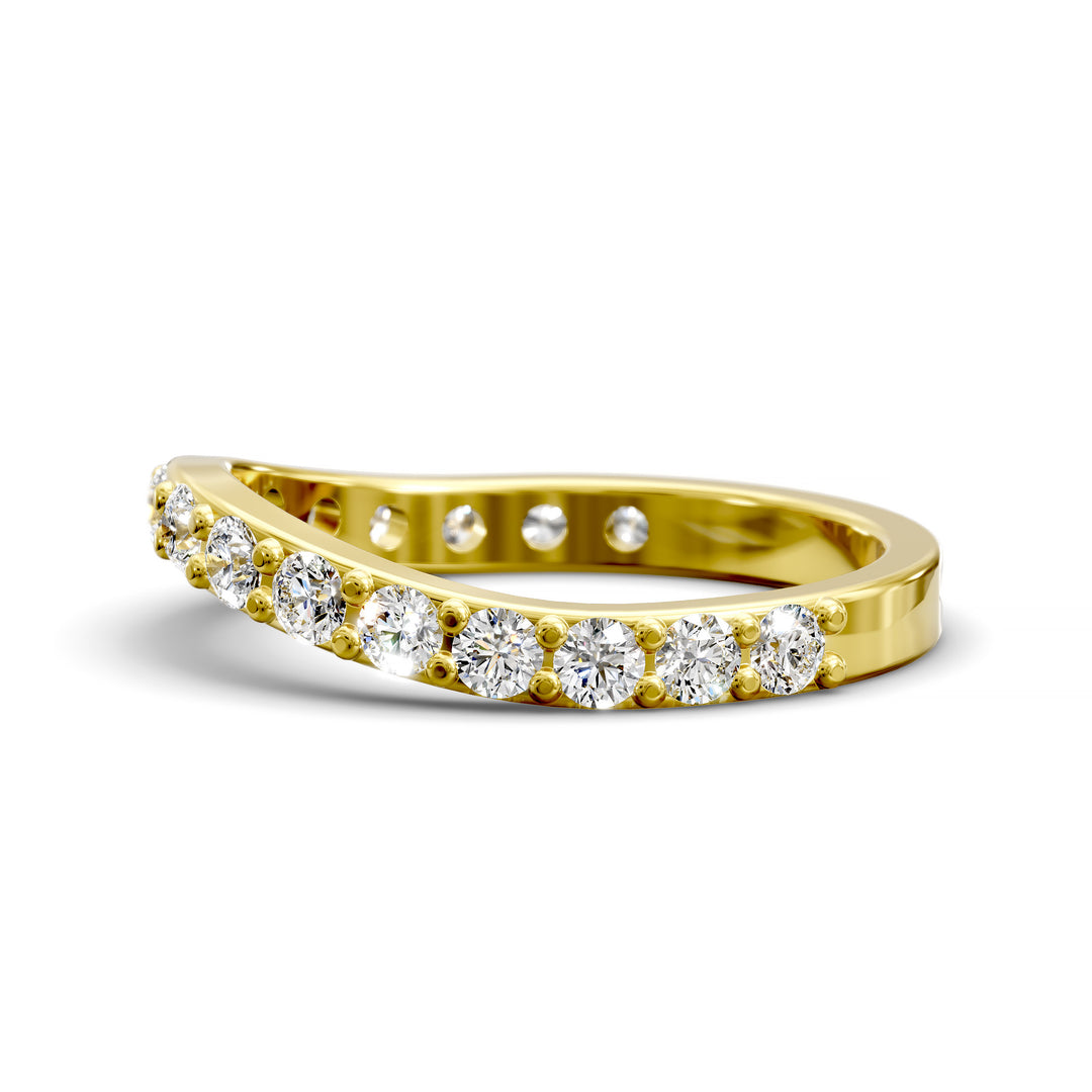 Curved half eternity diamond band with prong set round stones in polished gold