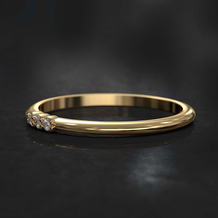 Dainty lab-grown diamond band with three diamonds on top, crafted in gold or platinum.