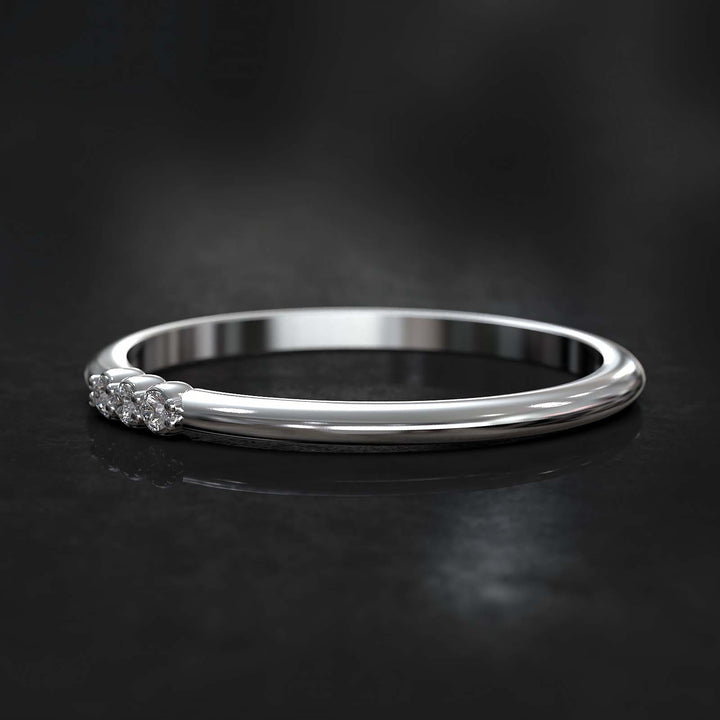 Dainty lab-grown diamond band with three diamonds on top, crafted in gold or platinum.