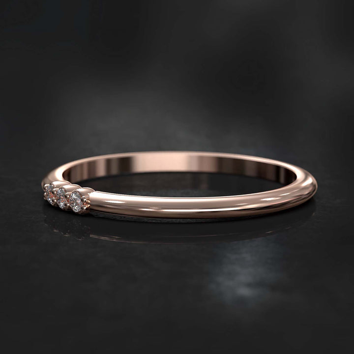 Dainty lab-grown diamond band with three diamonds on top, crafted in gold or platinum.
