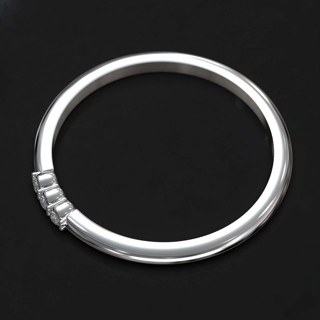 Dainty lab-grown diamond band with three diamonds on top, crafted in gold or platinum.