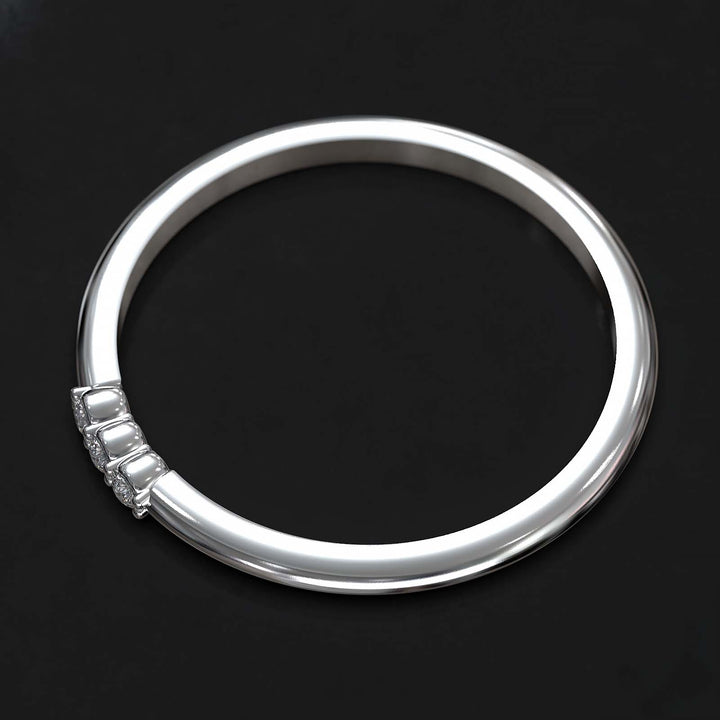 Dainty lab-grown diamond band with three diamonds on top, crafted in gold or platinum.